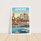 Grand tirage d'art sous cadre du poster d'Auxerre posé au sol sur parquet