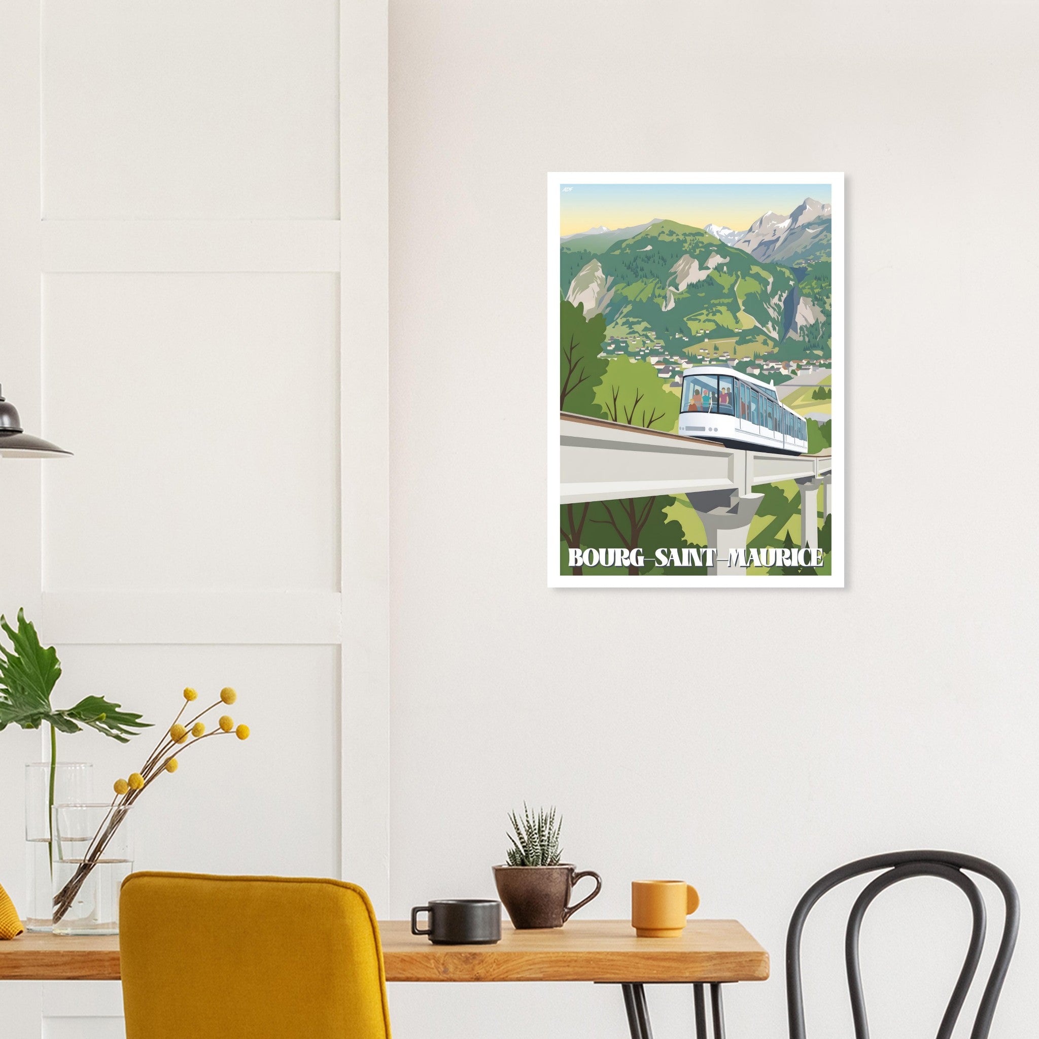 Affiche encadrée du funiculaire de Bourg-Saint-Maurice fixée au mur d'une salle à manger moderne