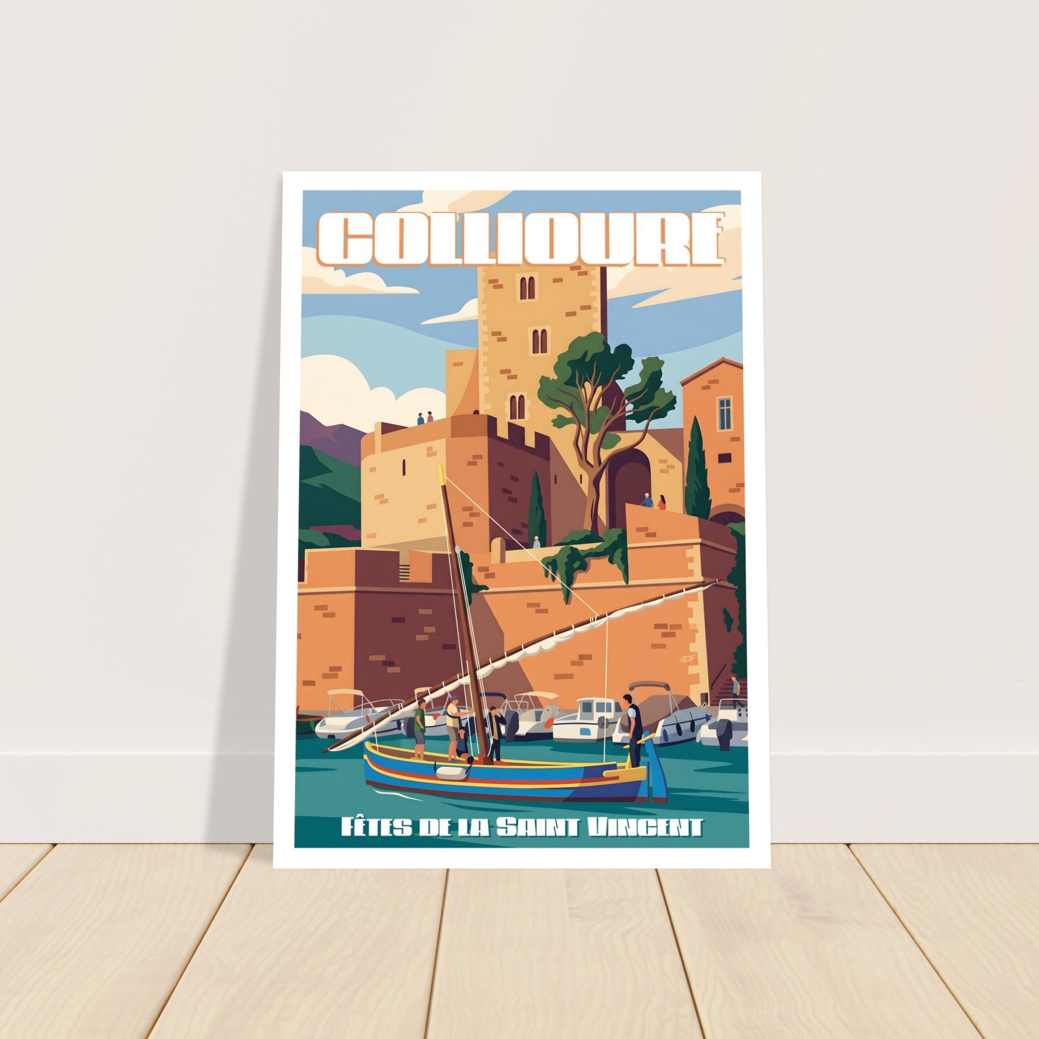 Grand tirage d'art sous cadre du poster des Fêtes de Collioure posé au sol sur parquet