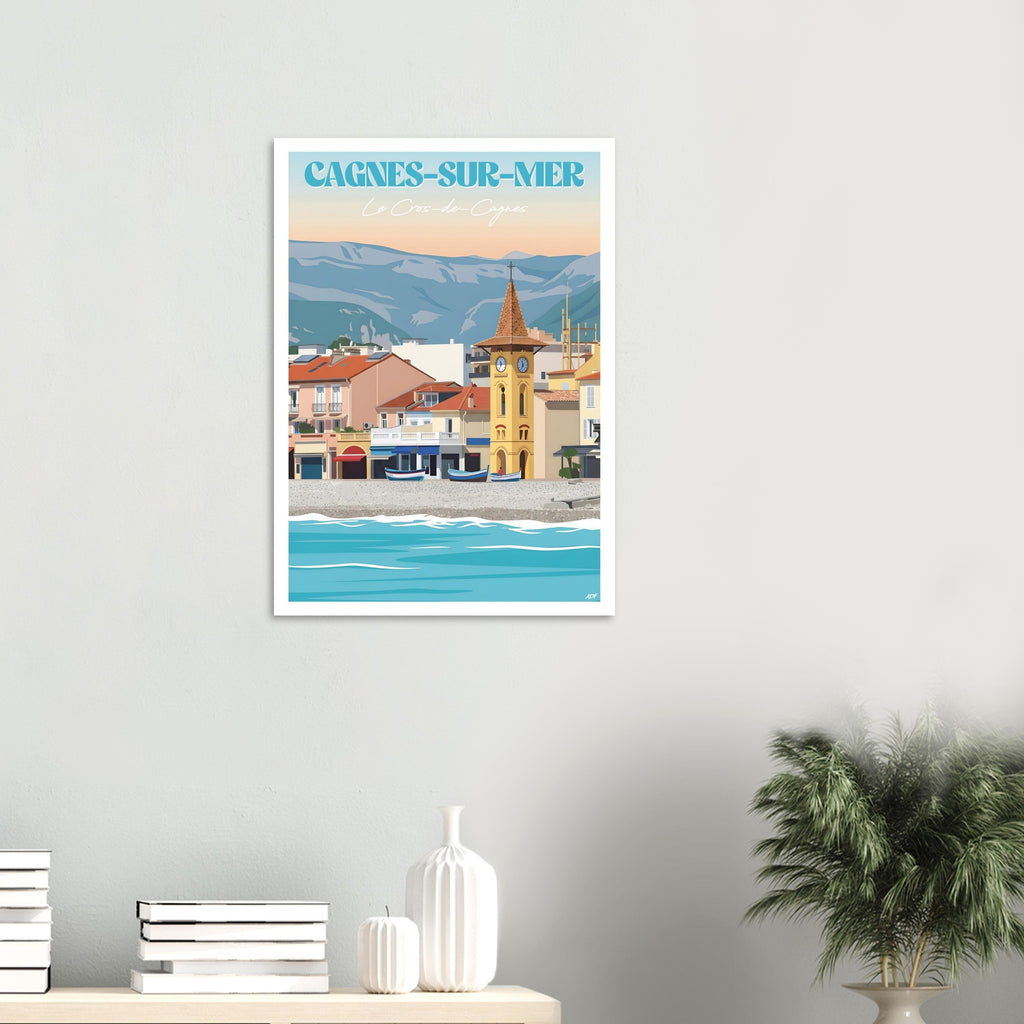 Grand poster encadré du Cros-de-Cagnes posé sur un sol en parquet contre un mur blanc