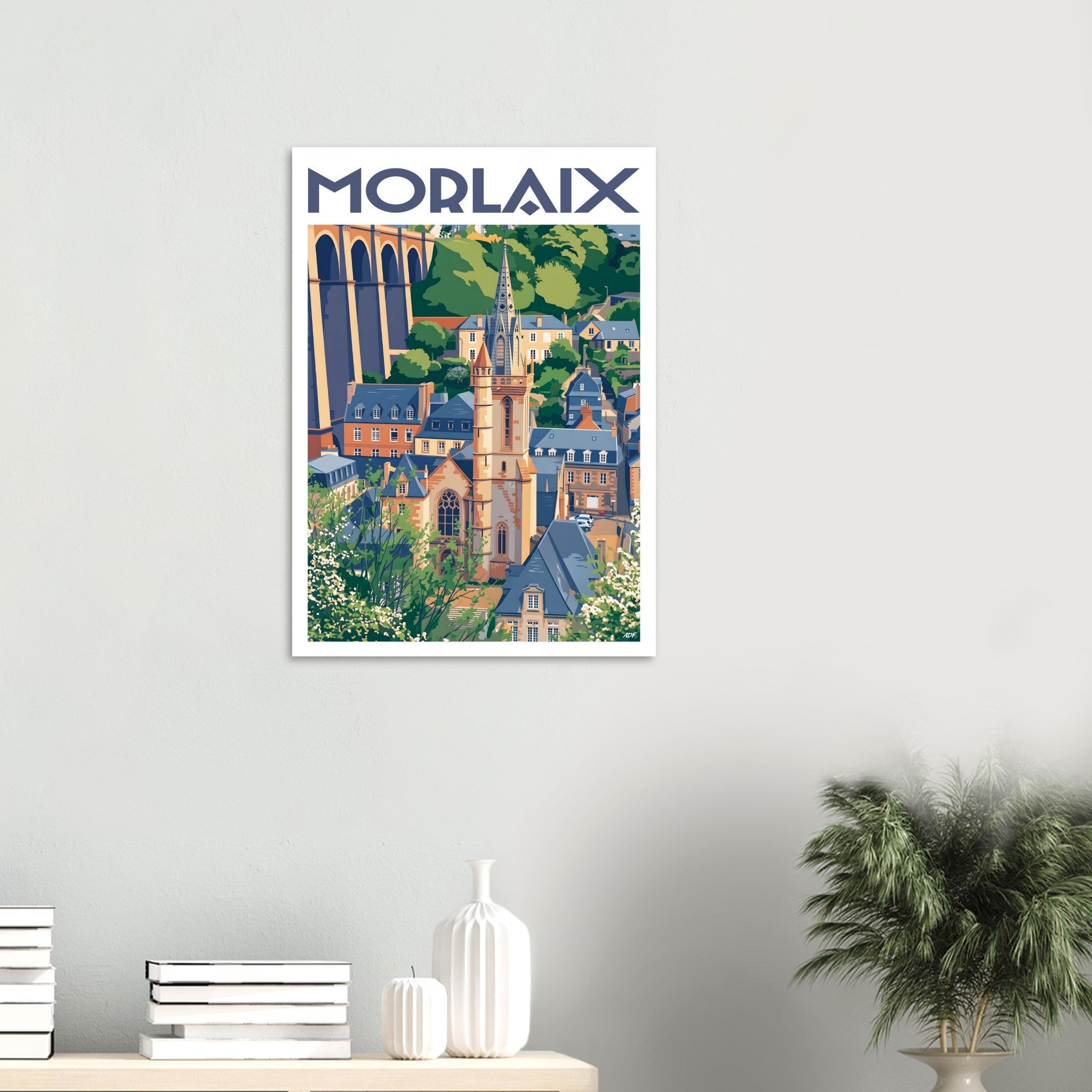 Affiche encadrée du viaduc de Morlaix accrochée au mur dans un salon lumineux