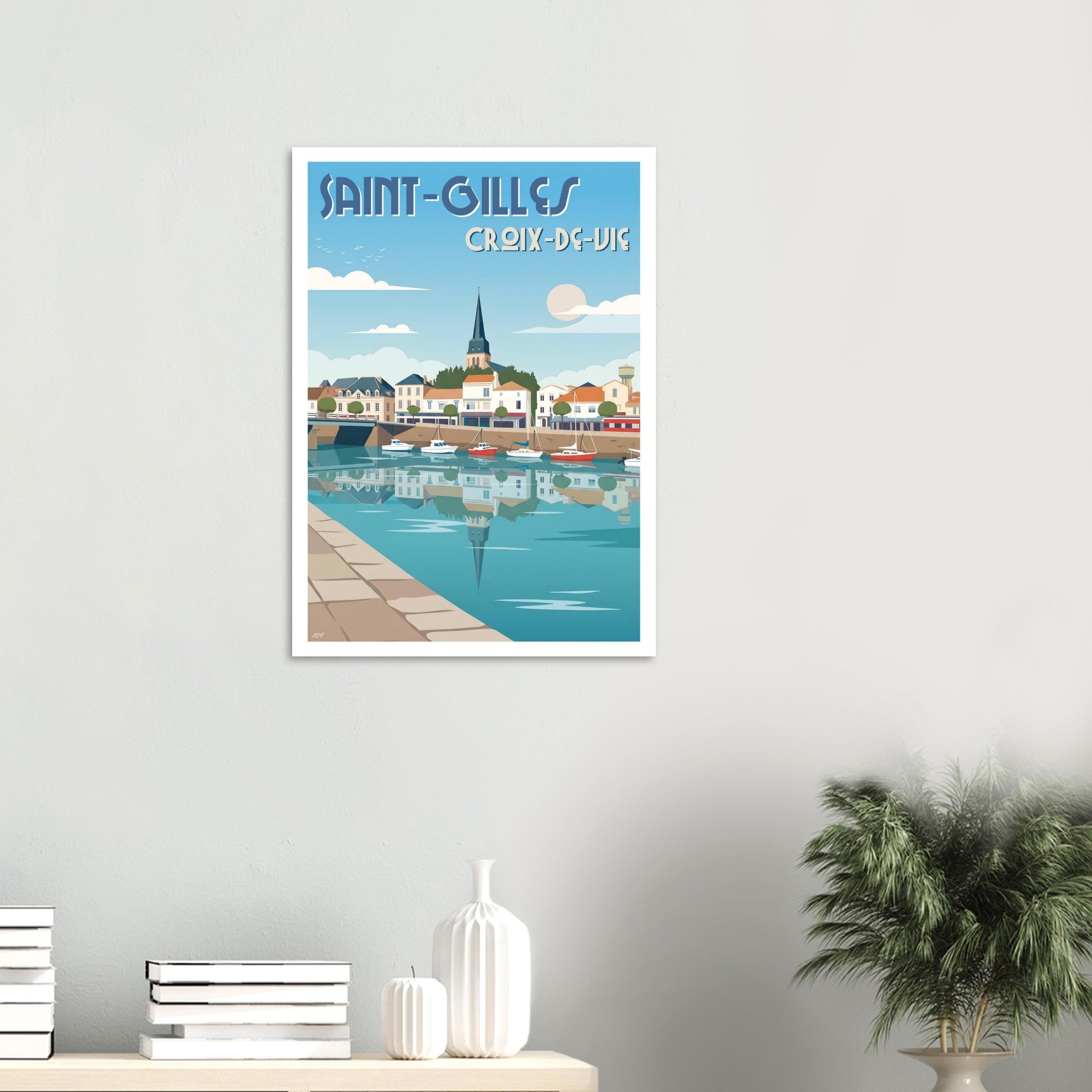Affiche encadrée de Saint-Gilles-Croix-de-Vie fixée au mur dans un décor épuré