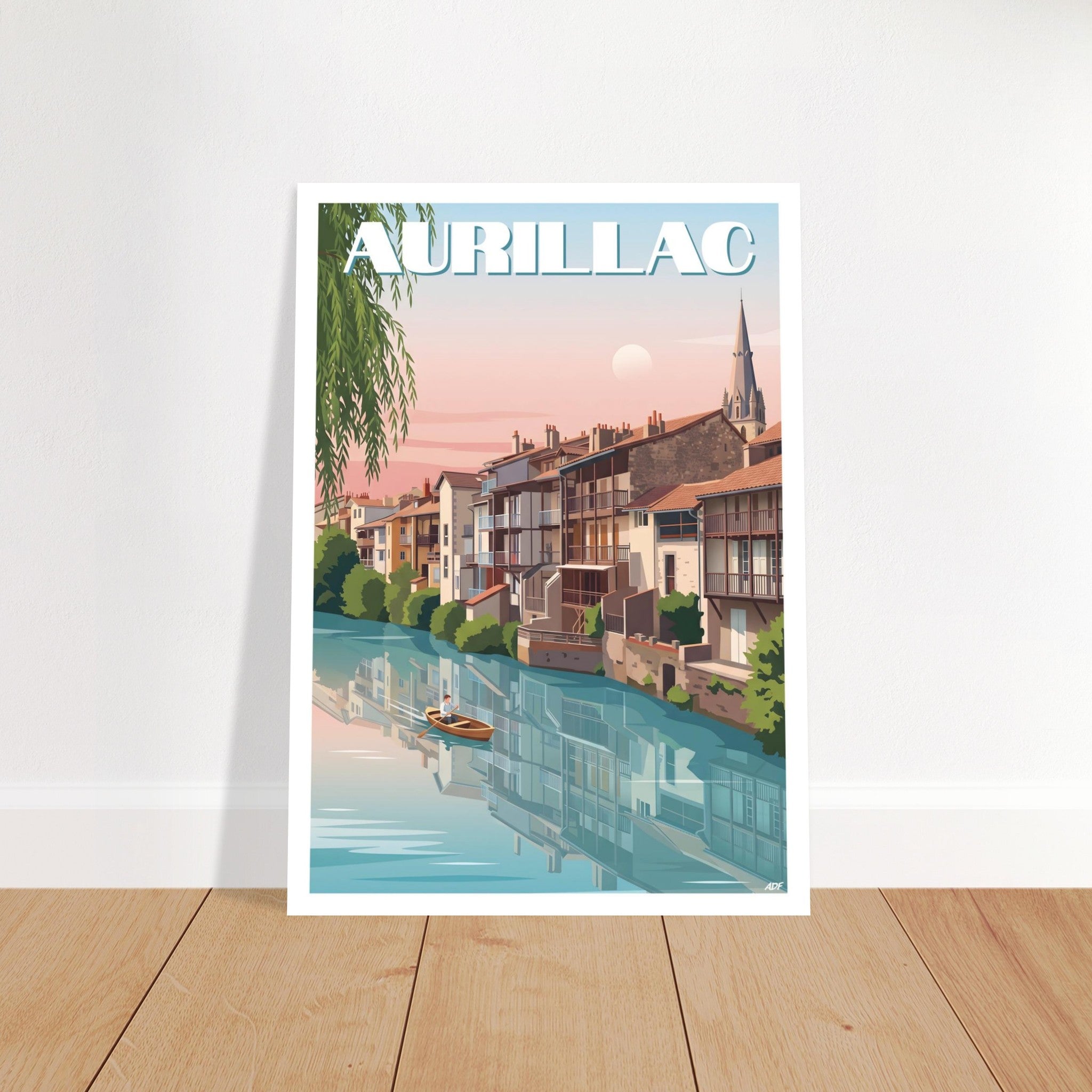 Grand tirage d'art sous cadre du poster d'Aurillac posé sur parquet en bois