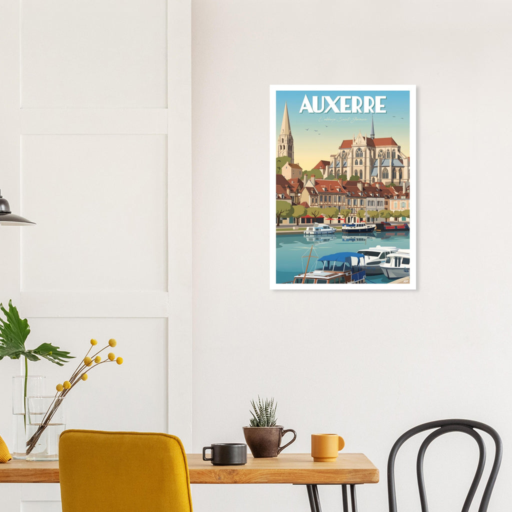 Cadre mural avec l'affiche d'Auxerre au-dessus d'une table à manger