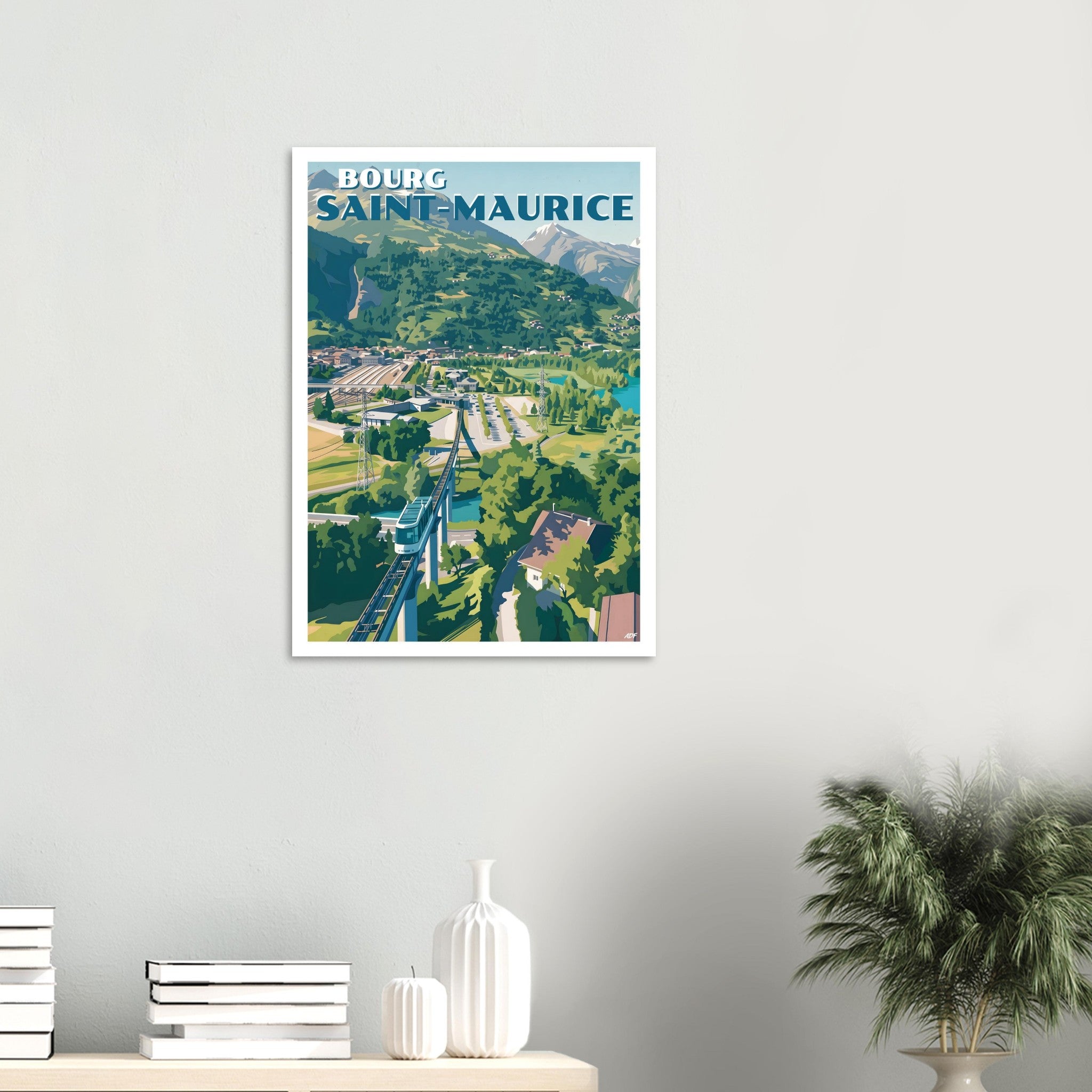 Tirage d'art de Savoie encadré au mur au-dessus d'un meuble design blanc