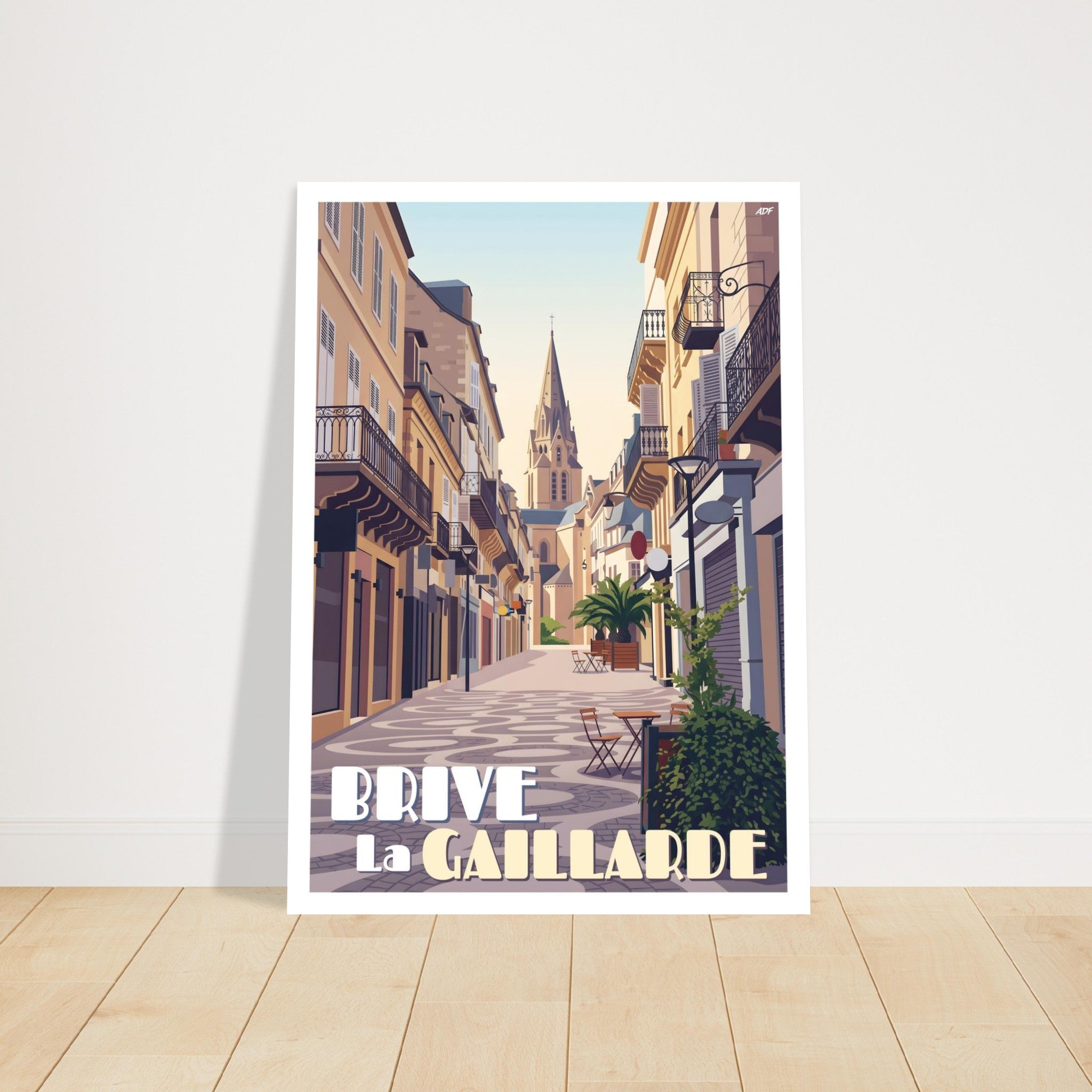 Grand tirage d'art sous cadre du poster de Brive-la-Gaillarde posé sur du parquet