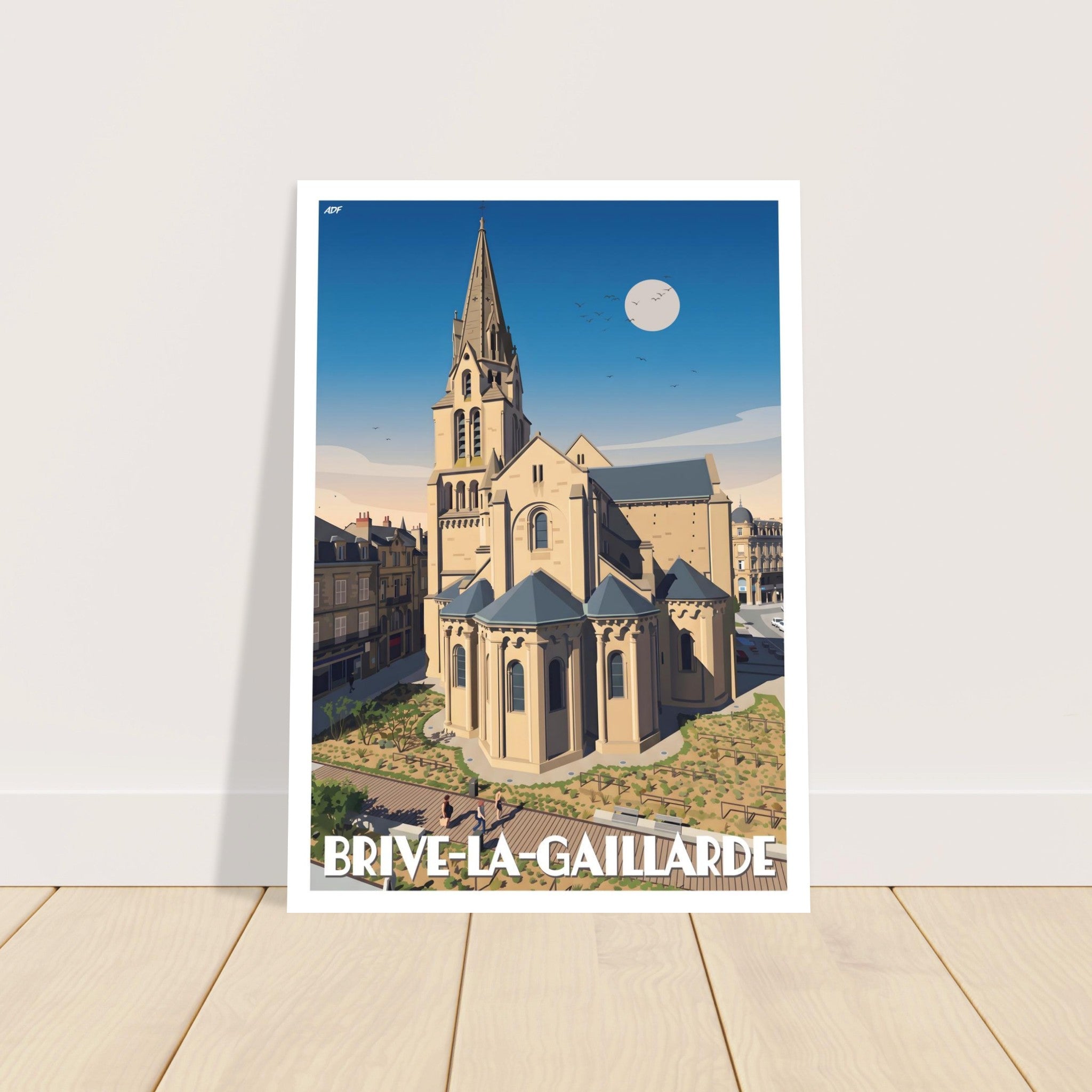 Grand poster encadré de la collégiale Saint-Martin de Brive posé sur du parquet