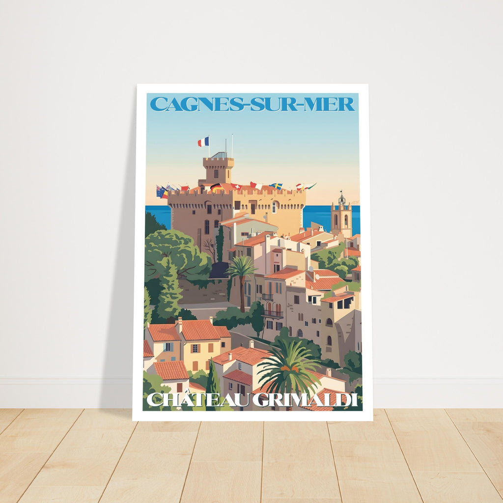 Grand tirage d'art sous cadre de l'affiche de Cagnes-sur-Mer posé sur un sol en parquet