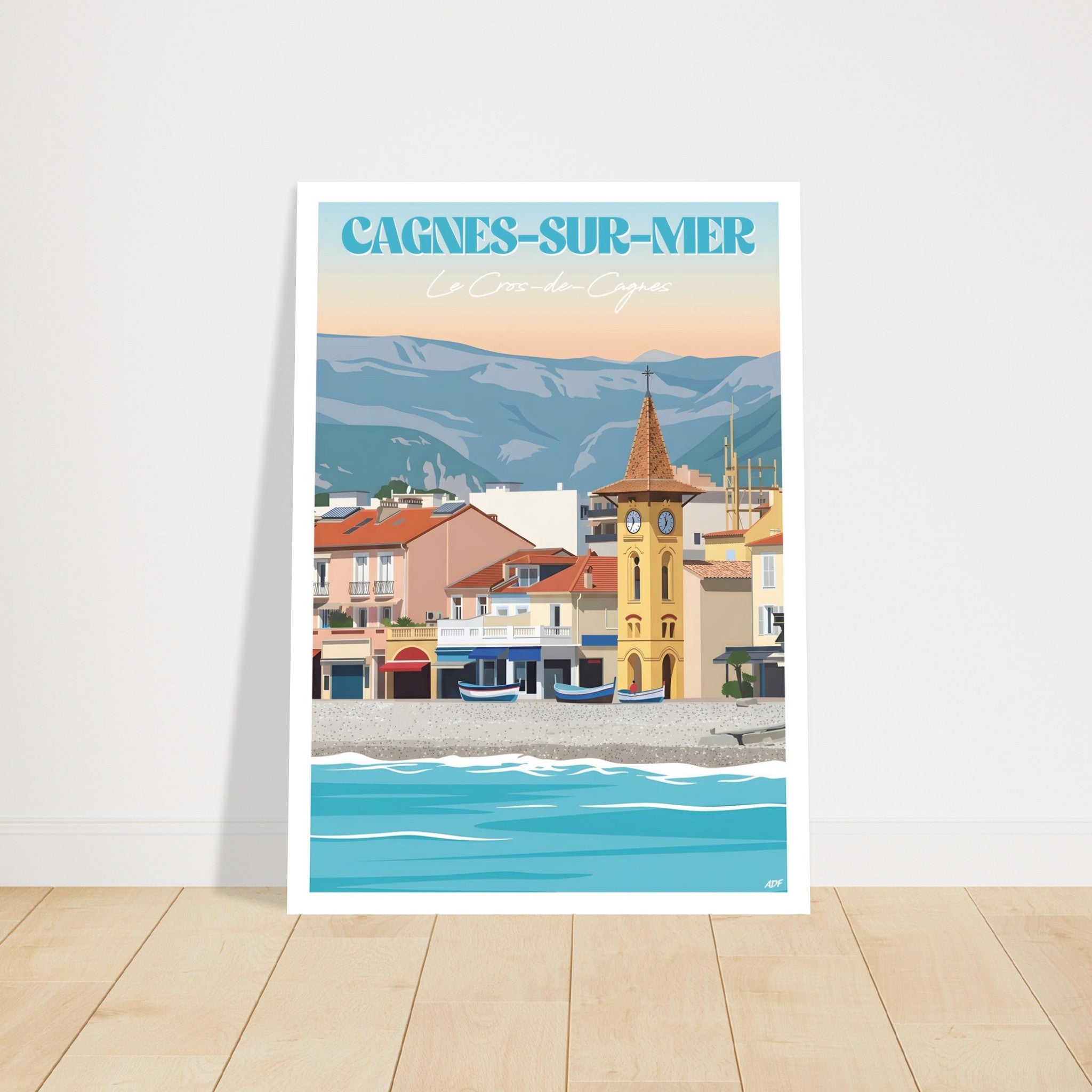 Tirage d'art sous cadre de l'affiche de Cagnes-sur-Mer posé au sol dans une ambiance chaleureuse