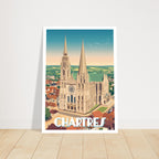 Grand poster d'art sous cadre de la cathédrale de Chartres posé sur du parquet
