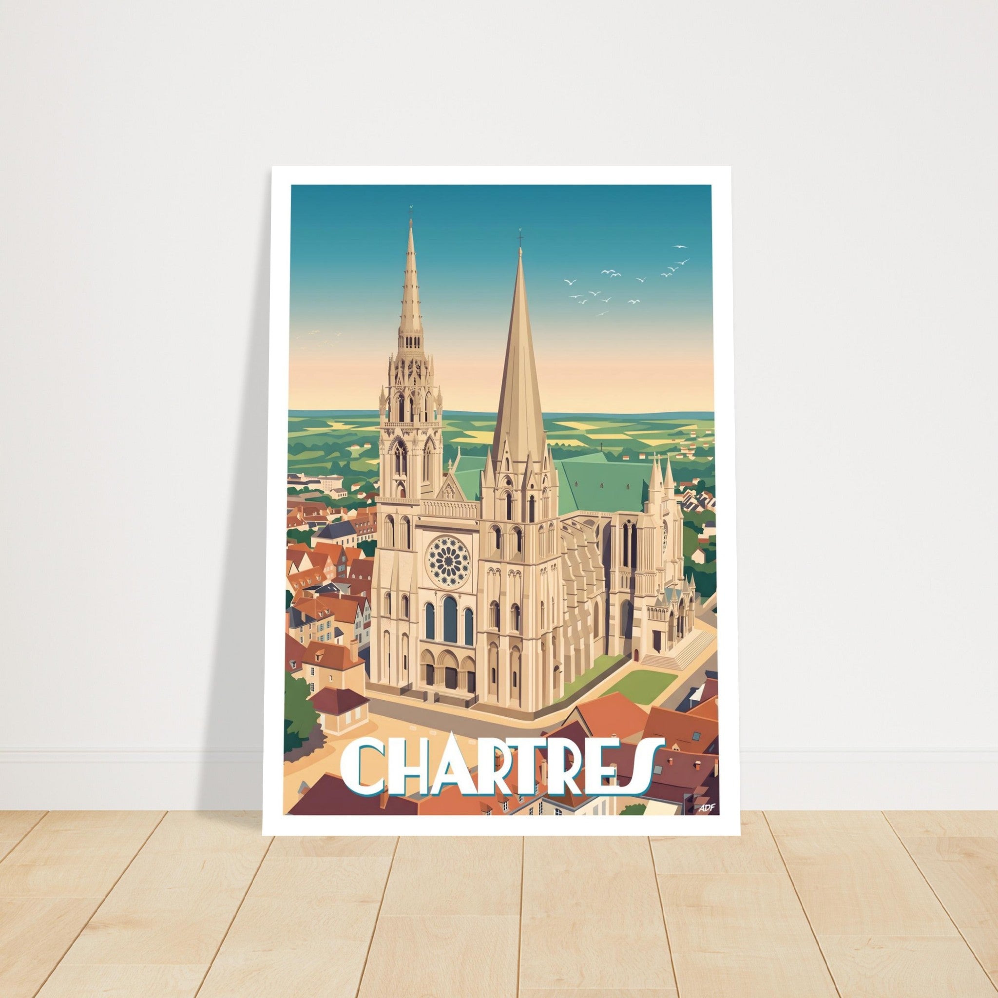 Grand poster d'art sous cadre de la cathédrale de Chartres posé sur du parquet