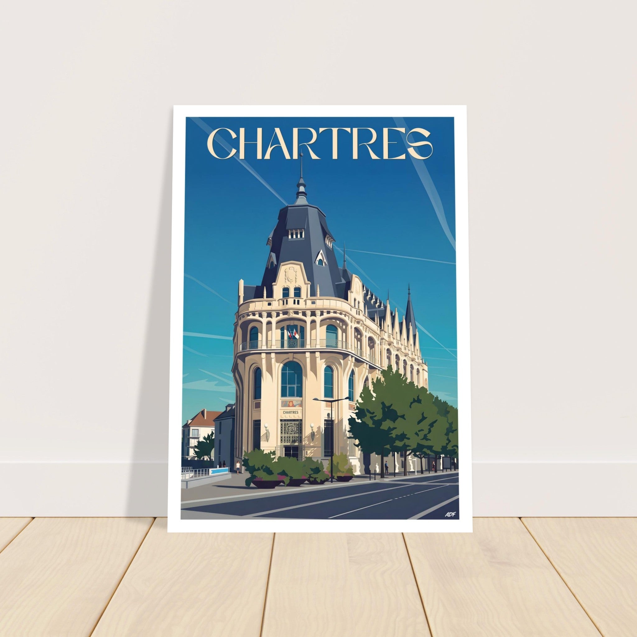Grand poster encadré de l'Hôtel des Postes de Chartres posé au sol sur parquet