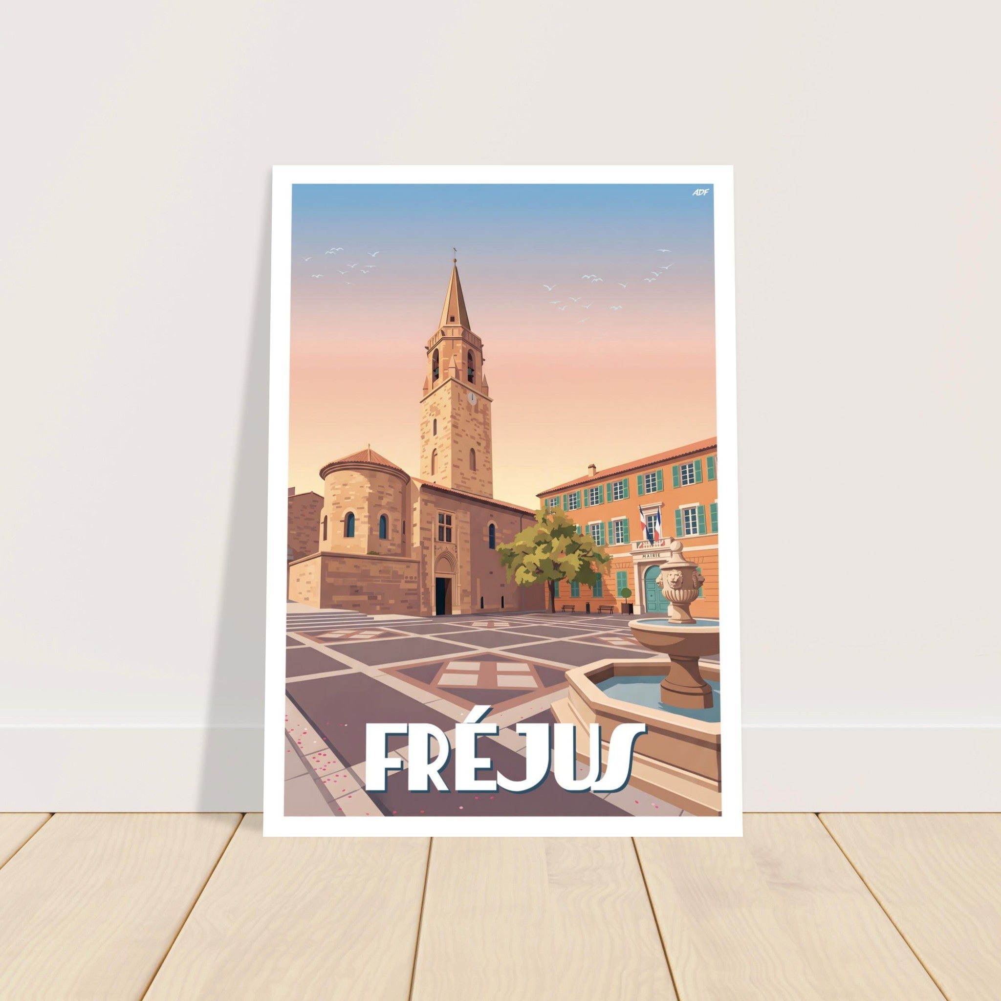 Grand tirage d'art sous cadre de l'affiche de Fréjus posé au sol sur du parquet en bois
