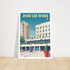 Grand poster d'art sous cadre de Joué-lès-Tours posé au sol sur parquet en bois