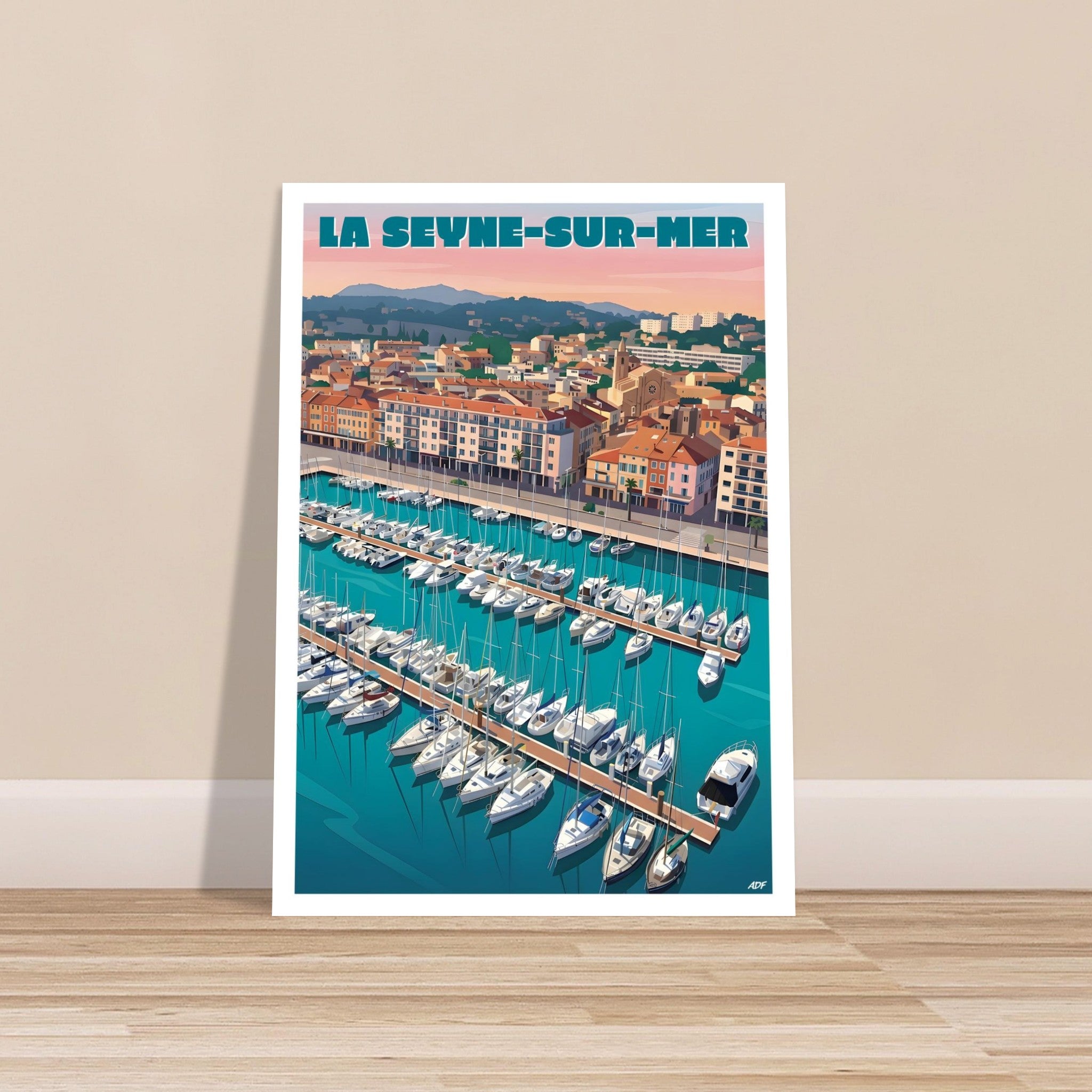 Tirage d'art sous cadre blanc de l'affiche de La Seyne-sur-Mer posé sur un parquet clair