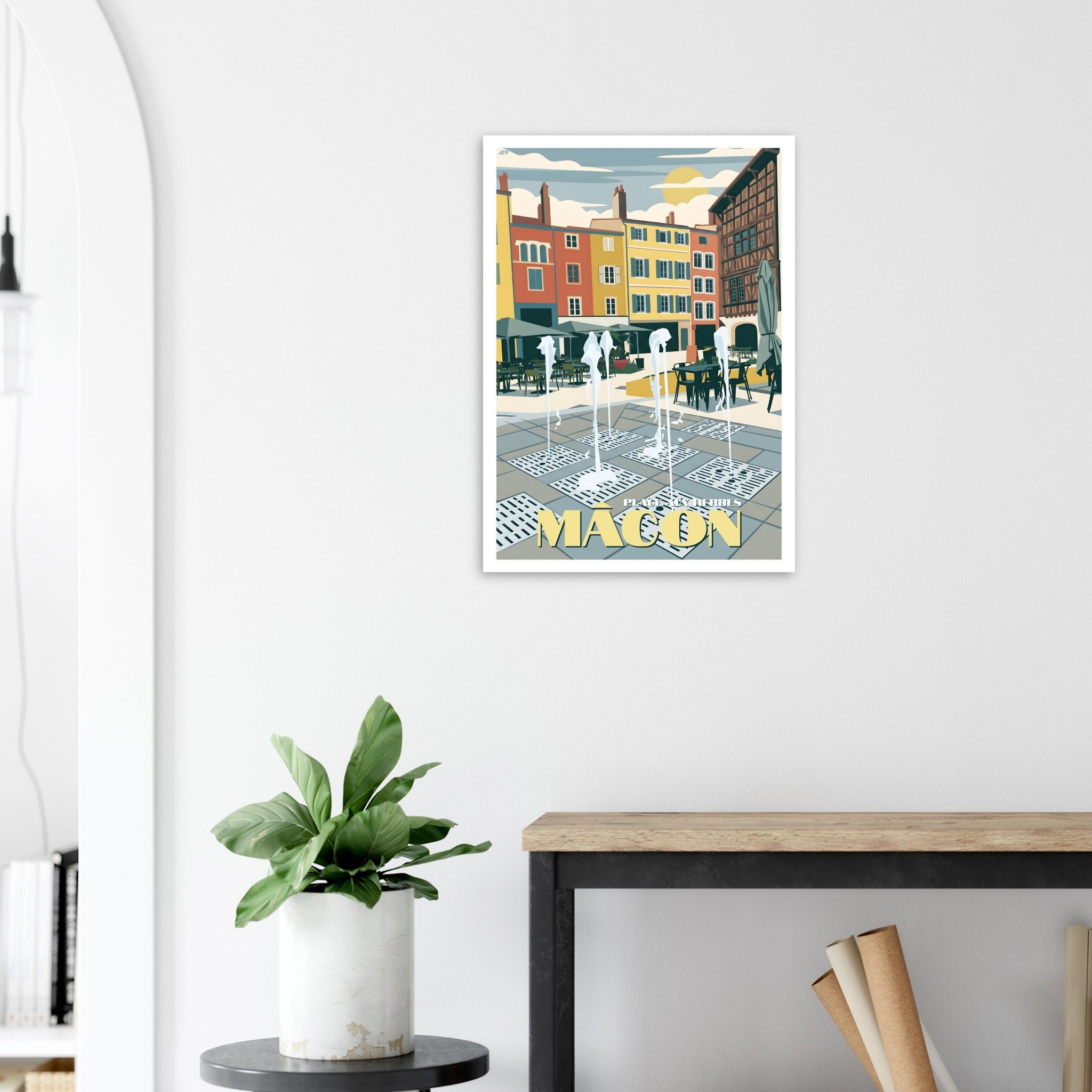 Poster de voyage de Mâcon sous cadre posé sur une console d'entrée moderne