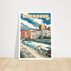 Grand tirage d'art sous cadre du poster de Narbonne posé au sol sur parquet