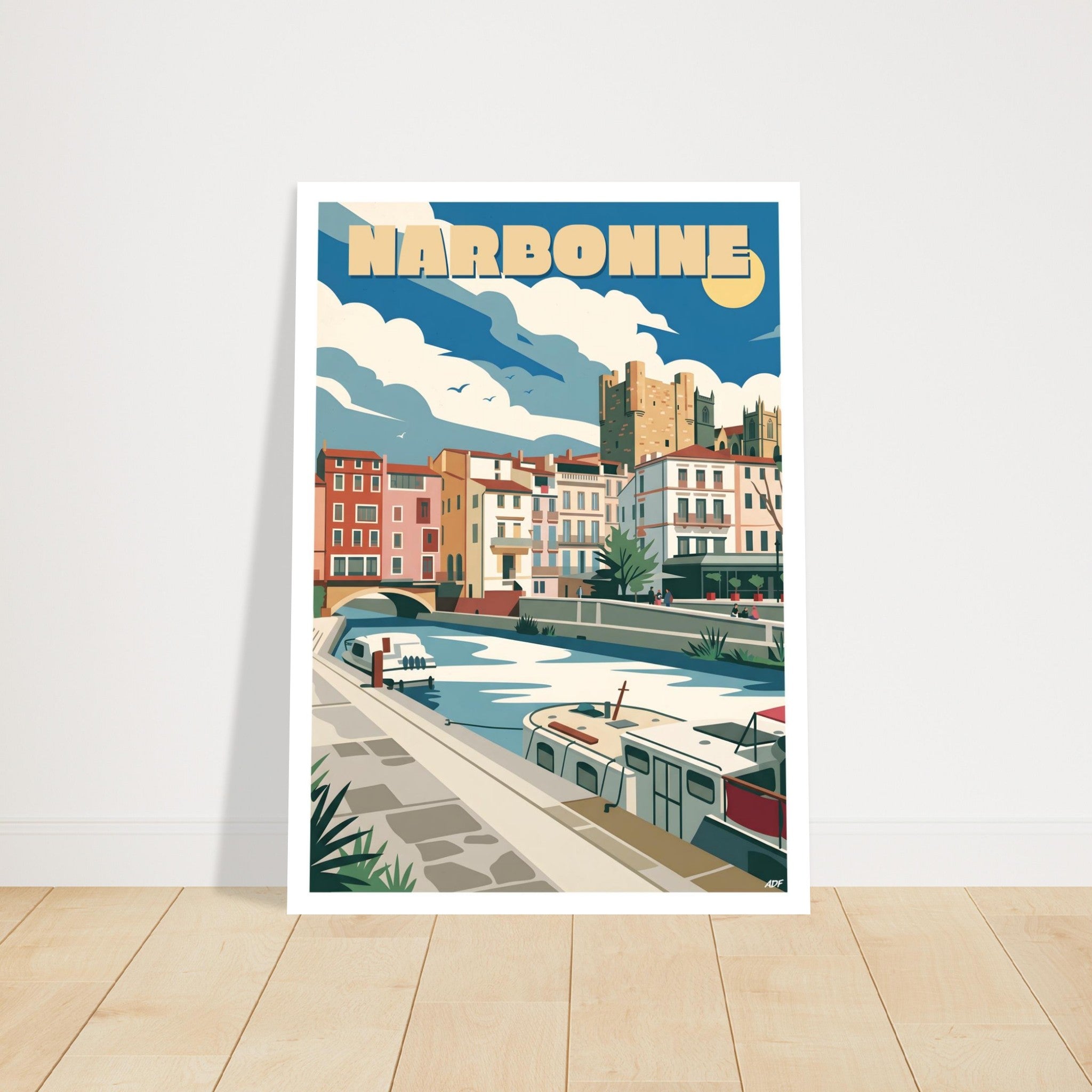 Grand tirage d'art sous cadre du poster de Narbonne posé au sol sur parquet
